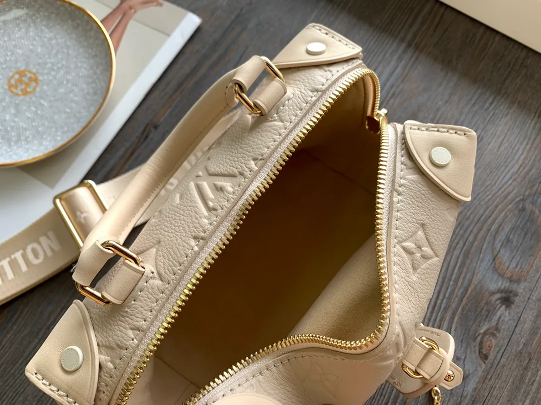 Louis Vuitton Petite Malle Souple Handbag