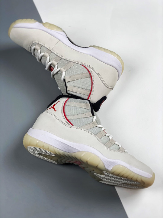 Air jordan 11 platinum tint/sail-university red