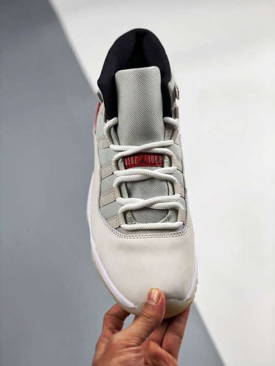 Air jordan 11 platinum tint/sail-university red