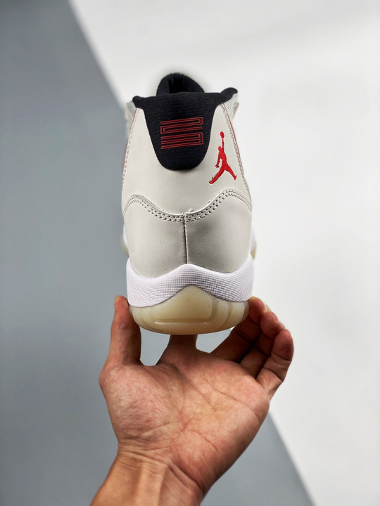 Air jordan 11 platinum tint/sail-university red