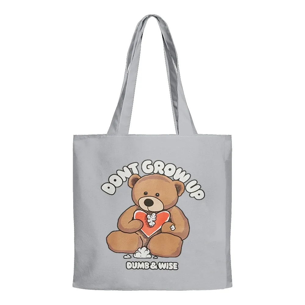 Don't Grow Up Tote Bag