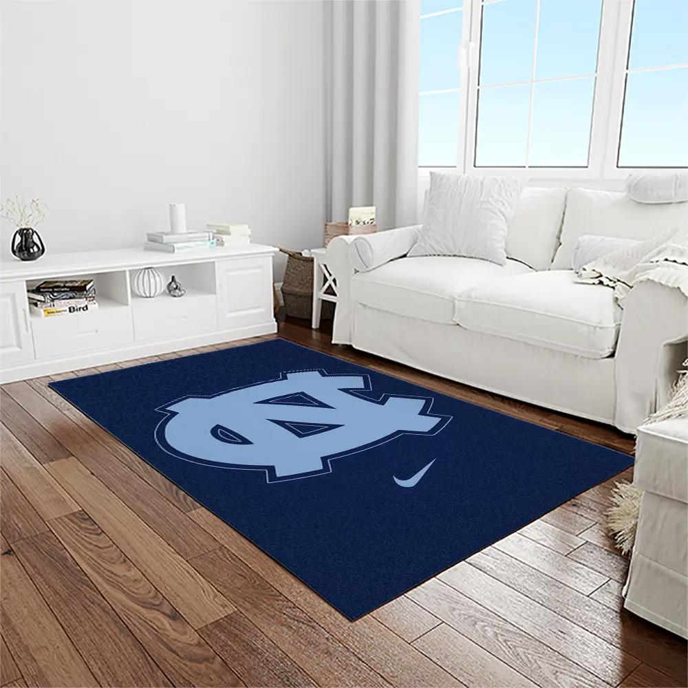 Ncaa north carolina tar heels college sport basketball and foolball team logo rectangle area rug ncth08 Rectangle Rug
