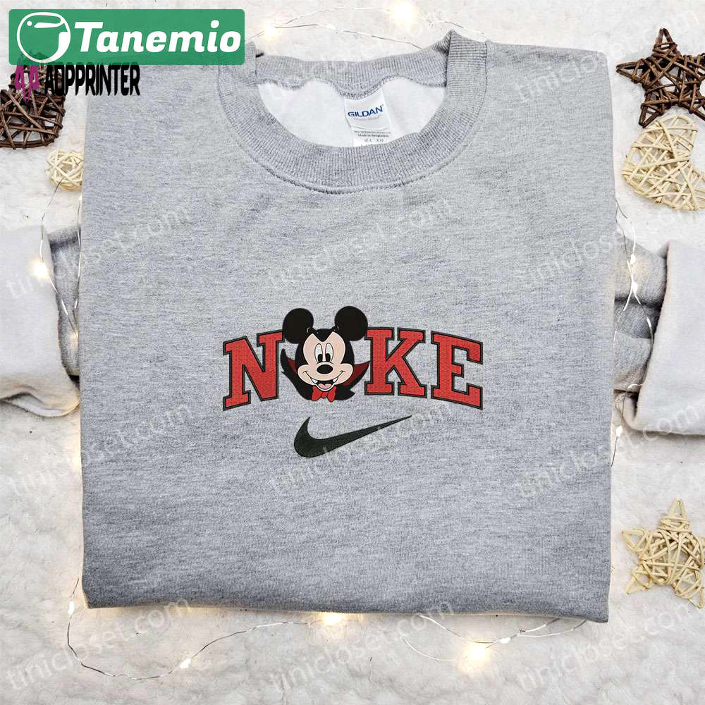 Nike halloween x mickey head dracula laughing sweatshirt: best disney characters embroidered shirt perfect halloween gift Embroidered Shirt