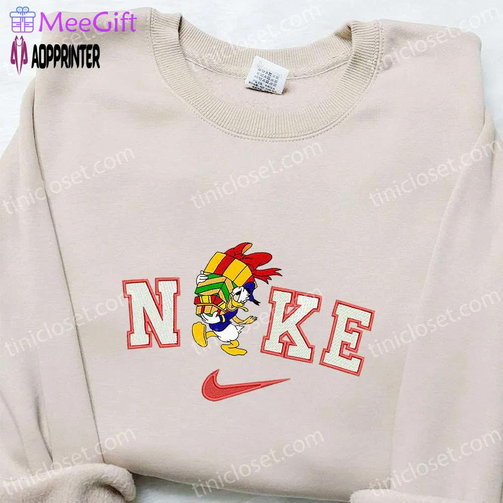 Nike x donald duck gifts embroidered sweatshirt walt disney christmas shirt – best gift ideas Embroidered Shirt