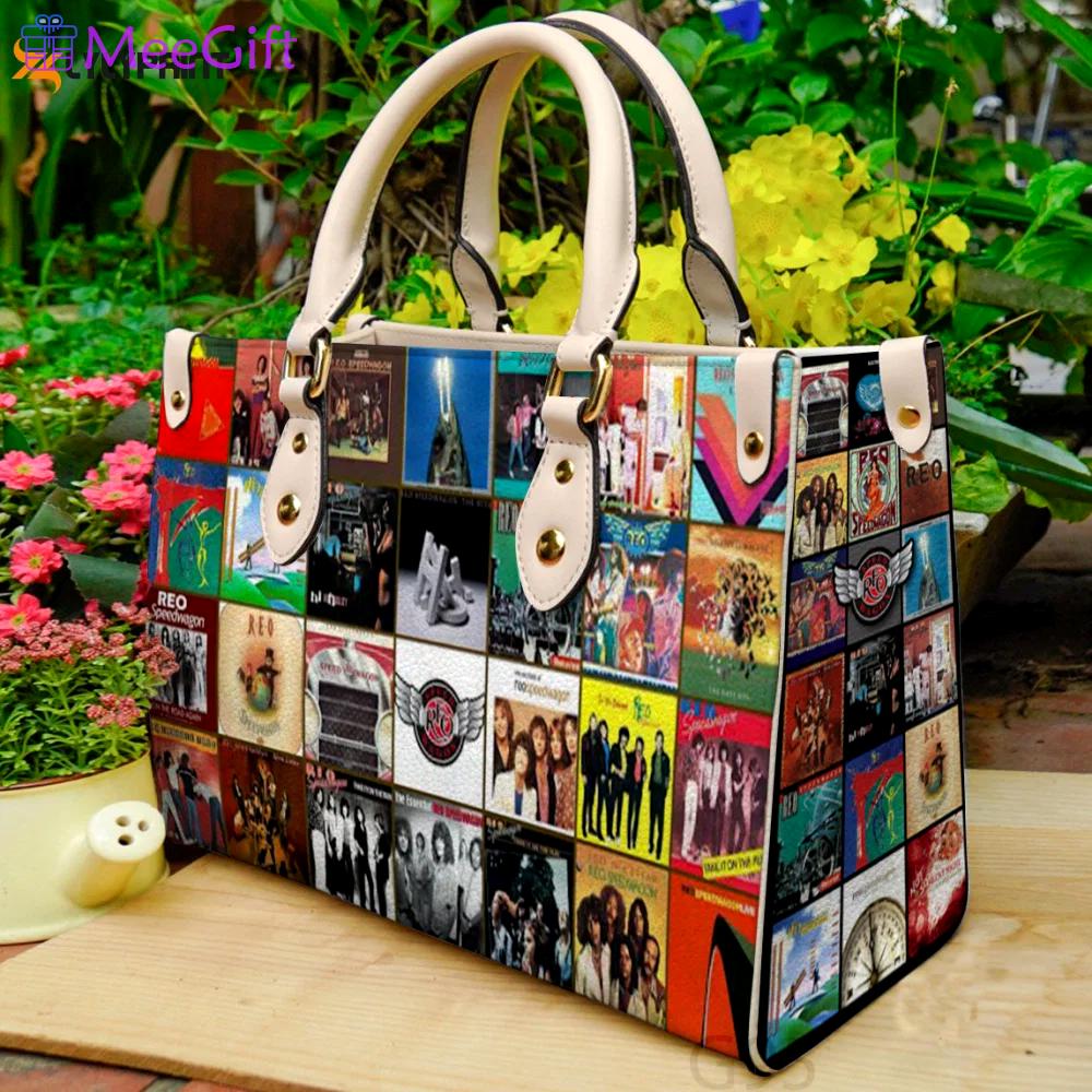 Reo speedwagonfor women giftand leather bag for women gift 2166 Women Leather Hand Bag