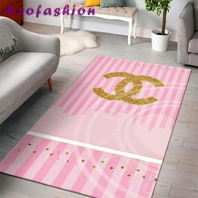Chanel pinky golden logo type 16. Upgrade Your Living Room with Luxury Home Decor: Area Carpets, Floor Decor, Door Mats, and Hot Gift Items with style a High-End Fashion Brand Rectangle Rug