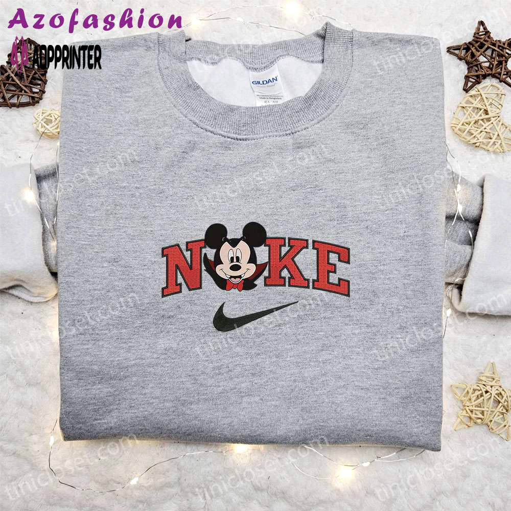 Nike halloween x mickey head dracula laughing sweatshirt: best disney characters embroidered shirt perfect halloween gift Embroidered Shirt