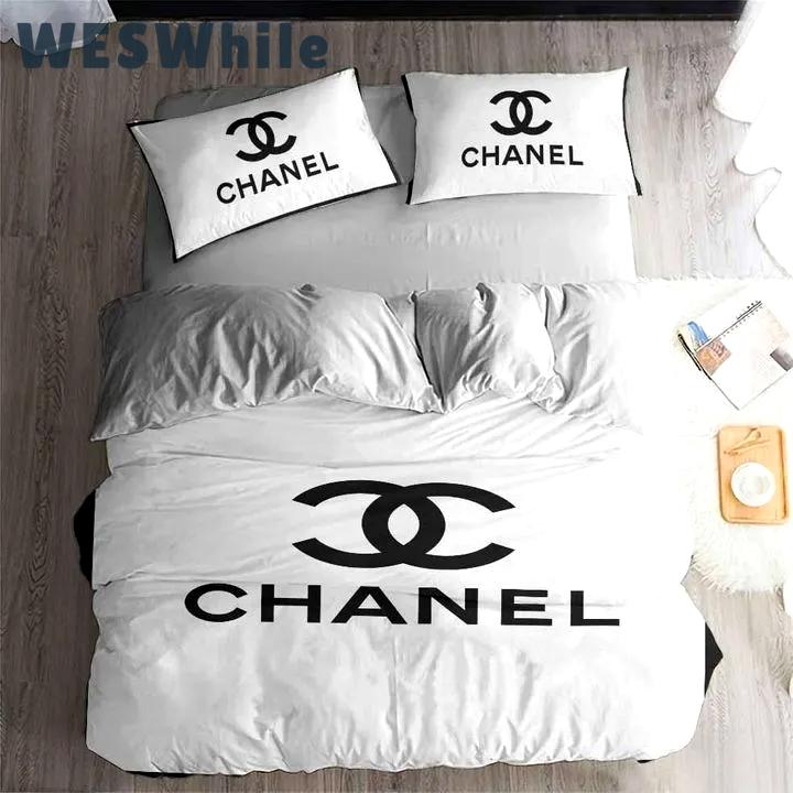 Chanel white logo bedding 3d printed bedding sets quilt sets duvet cover luxury brand bedding decor bedroom sets best luxury bed sets gift thankgivings and christmas Bedding Sets
