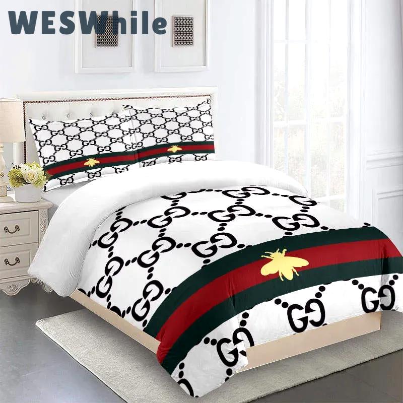Gucci fashion logo limited luxury brand bedding sets, bedroom decor , thanksgiving decorations for home 03 best luxury bed sets gift thankgivings and christmas Bedding Sets