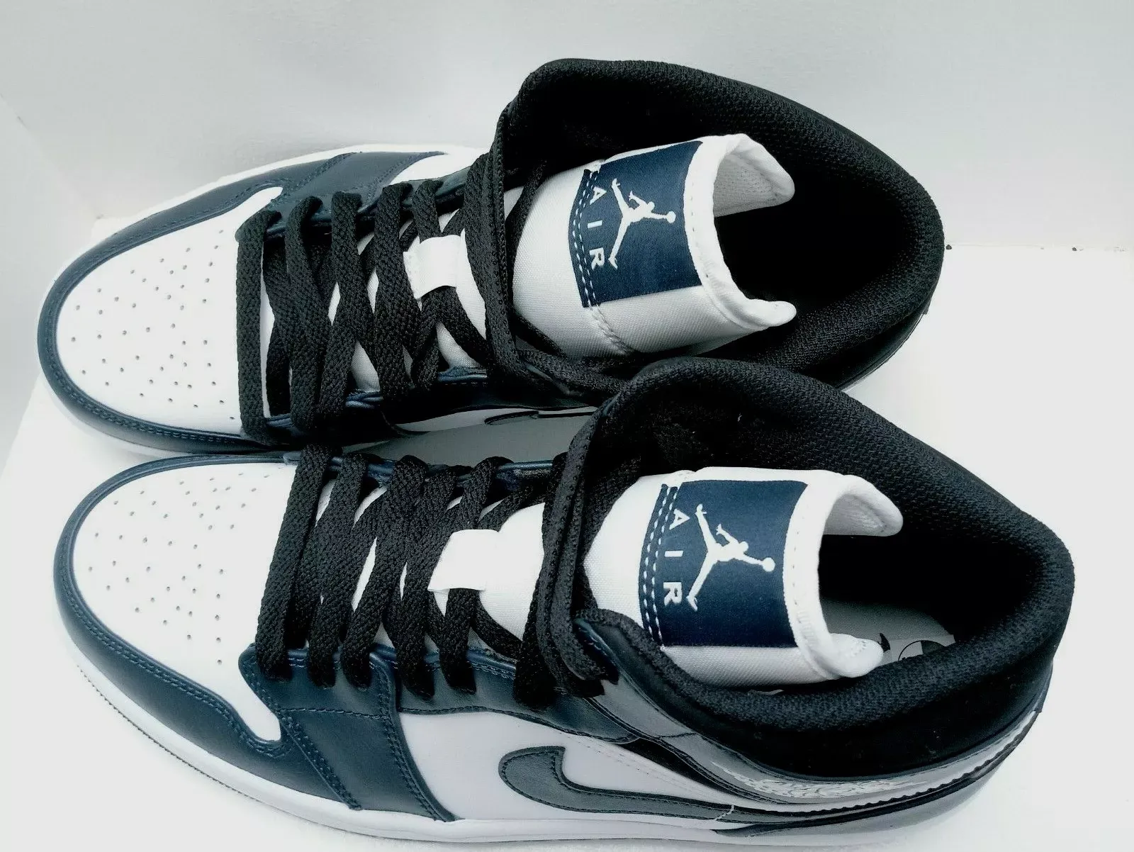 NIKE Air Jordan 1 Mid-Top - Navy Blue and White Sneakers