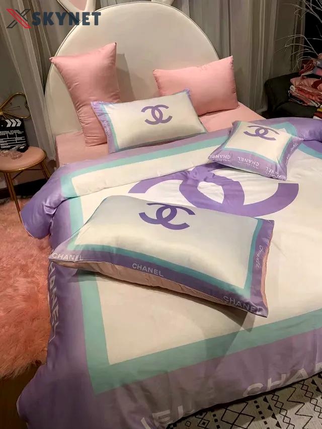 Chanel logo violet printed bedding sets quilt sets duvet cover luxury brand bedding decor bedroom sets best luxury bed sets gift thankgivings and christmas Bedding Sets