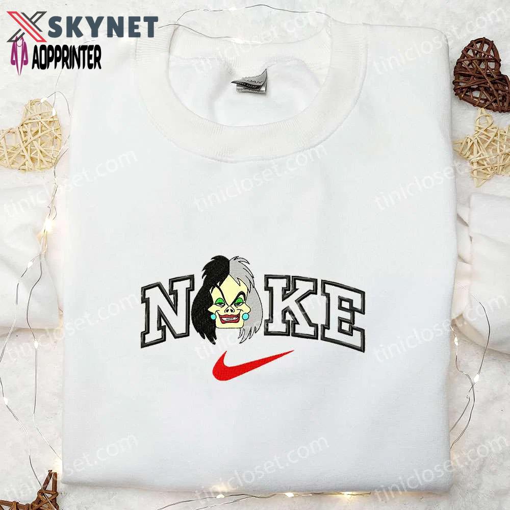 Cruella x nike cartoon embroidered shirt – iconic cruella de vil design for nike fans Embroidered Shirt