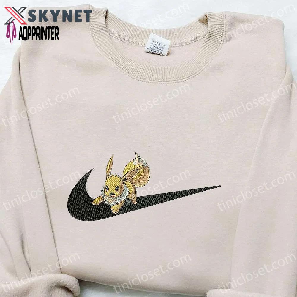 Eevee x swoosh hoodie pokemon & custom embroidered shirts: trendy and unique apparel Embroidered Shirt