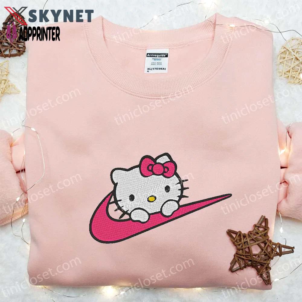 Hello kitty x nike swoosh cartoon tshirt: embroidered shirt with nike inspiration Embroidered Shirt