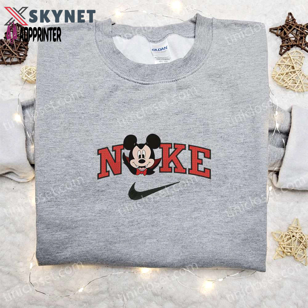Nike halloween x mickey head dracula laughing sweatshirt: best disney characters embroidered shirt perfect halloween gift Embroidered Shirt