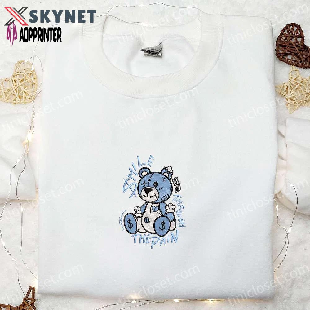 Smile through the pain blue bear embroidered shirt: cool gift for family Embroidered Shirt