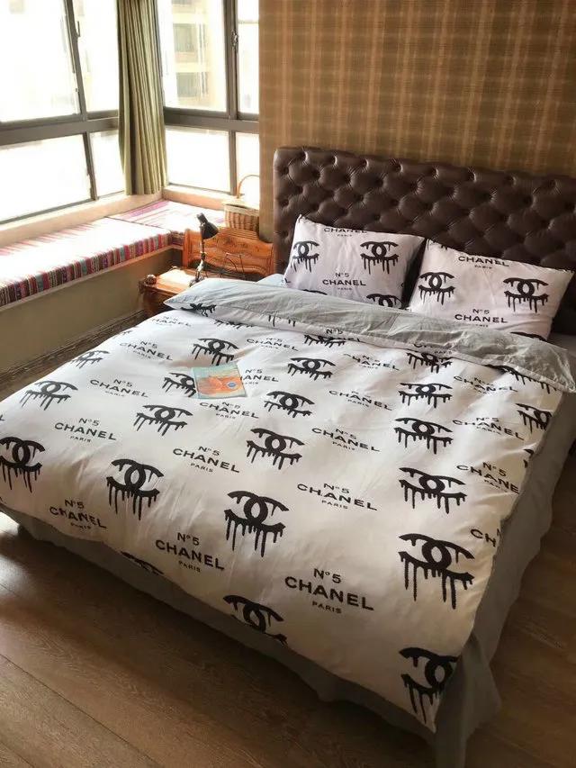 Chanel white dirty logo bedding 3d printed bedding sets quilt sets duvet cover luxury brand bedding decor bedroom sets best luxury bed sets gift thankgivings and christmas Bedding Sets