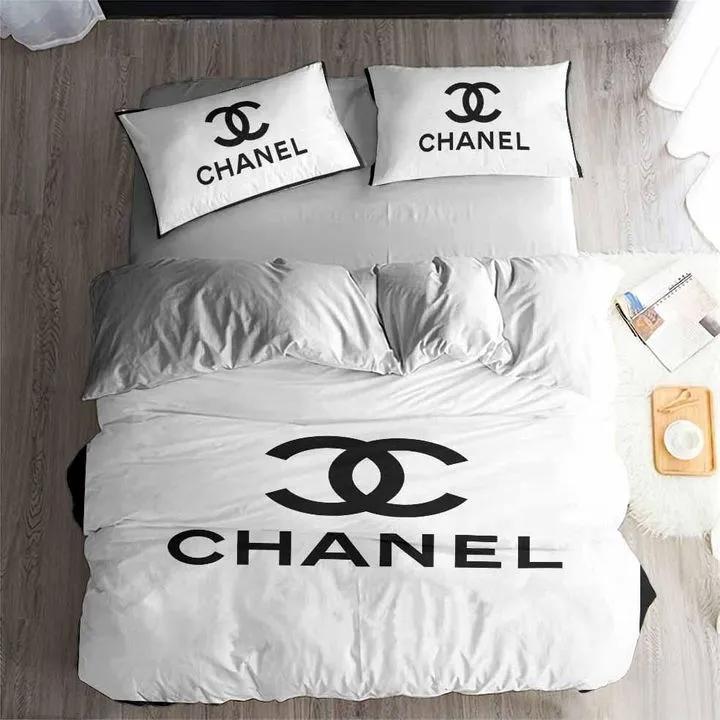 Chanel white logo bedding 3d printed bedding sets quilt sets duvet cover luxury brand bedding decor bedroom sets best luxury bed sets gift thankgivings and christmas Bedding Sets