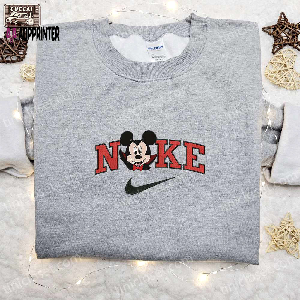 Nike halloween x mickey head dracula laughing sweatshirt: best disney characters embroidered shirt perfect halloween gift Embroidered Shirt