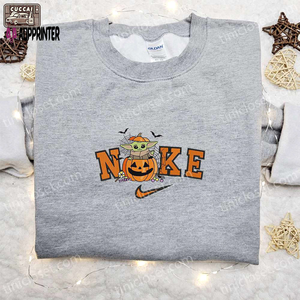 Nike x baby yoda pumpkin sweatshirt: halloween embroidered shirt best gift idea Embroidered Shirt