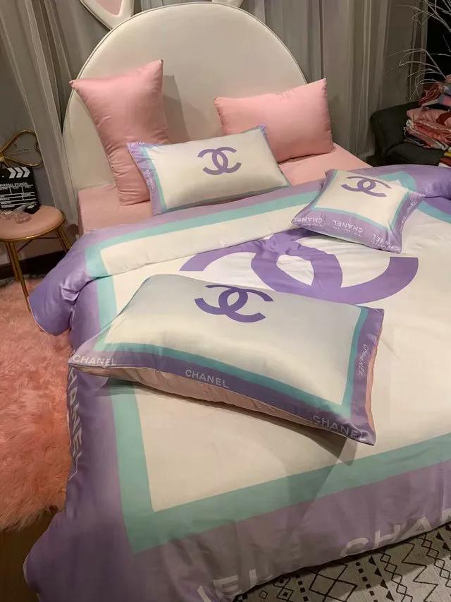 Chanel logo violet printed bedding sets quilt sets duvet cover luxury brand bedding decor bedroom sets best luxury bed sets gift thankgivings and christmas Bedding Sets