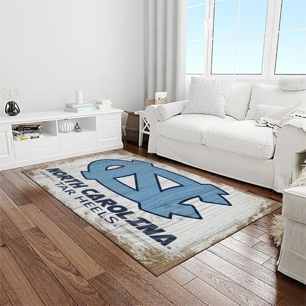 Ncaa north carolina tar heels college sport basketball and foolball team logo rectangle area rug ncth51 Rectangle Rug
