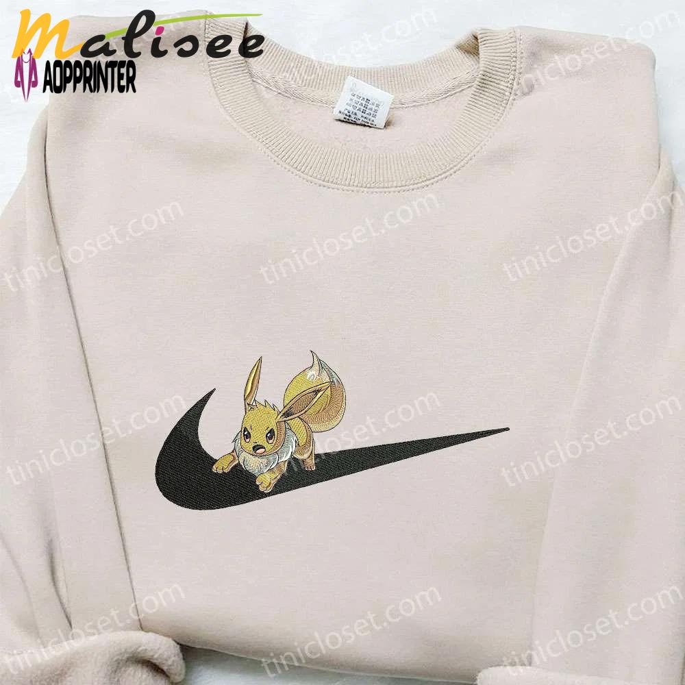 Eevee x swoosh hoodie pokemon & custom embroidered shirts: trendy and unique apparel Embroidered Shirt