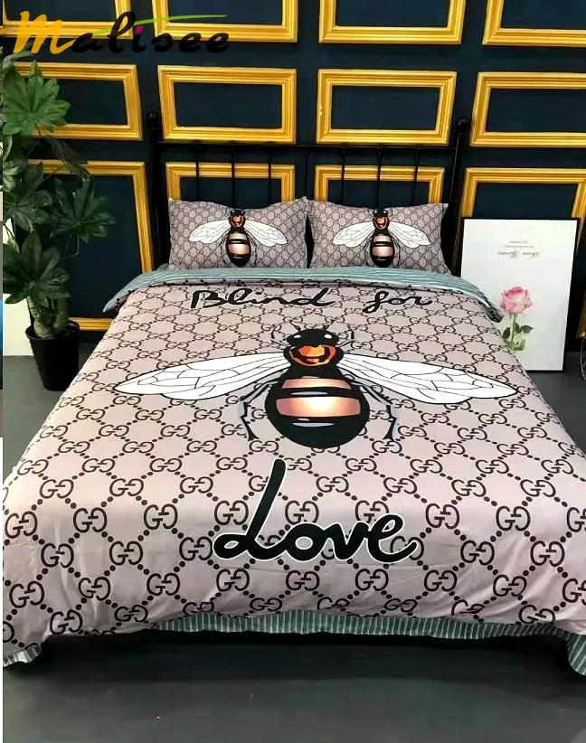 Gucci bee love new logo hot luxury brand bedding sets bedspread duvet cover set, bedroom decor , thanksgiving decorations for home best luxury bed sets gift thankgivings and christmas Bedding Sets