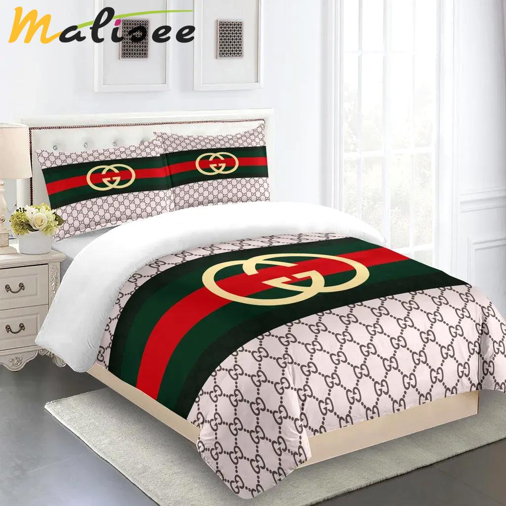 Gucci fashion logo limited luxury brand bedding sets, bedroom decor , thanksgiving decorations for home 05 best luxury bed sets gift thankgivings and christmas Bedding Sets
