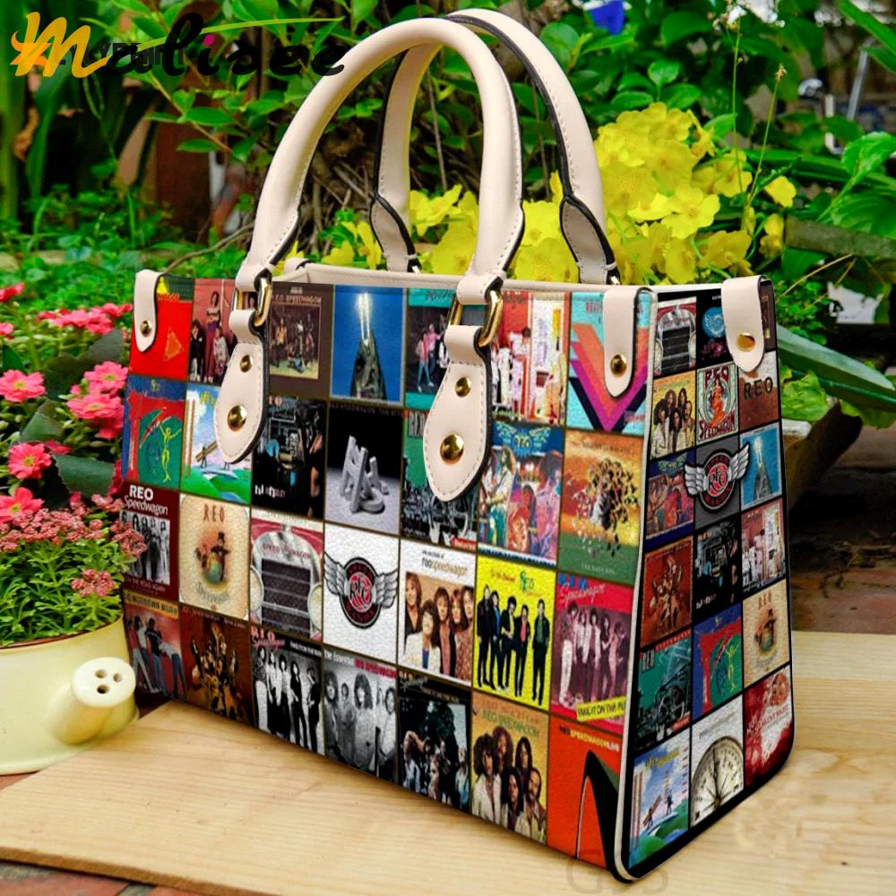 Reo speedwagonfor women giftand leather bag for women gift 2166 Women Leather Hand Bag