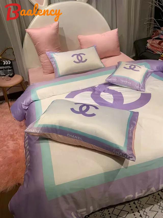 Chanel logo violet printed bedding sets quilt sets duvet cover luxury brand bedding decor bedroom sets best luxury bed sets gift thankgivings and christmas bedding sets