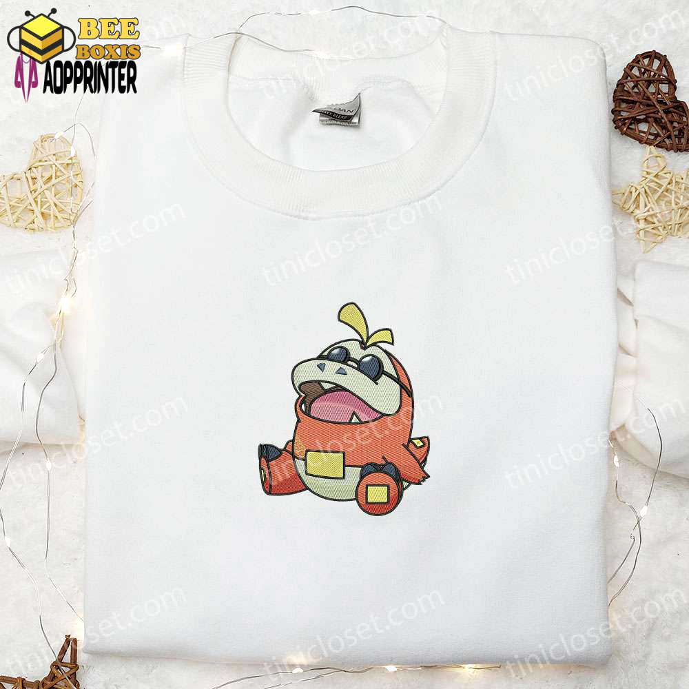 Fuecoco pokemon anime embroidered shirt: stylish & collectible pokemon merchandise