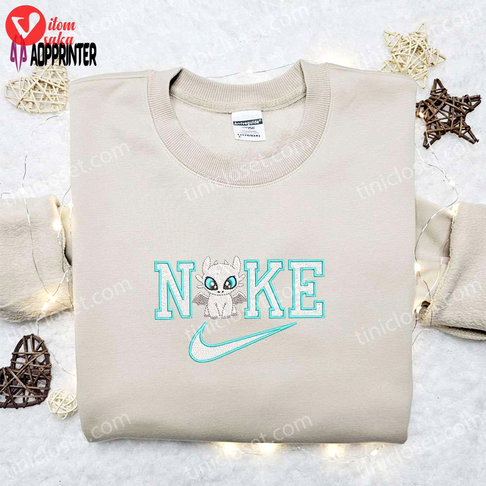 Disney light fury x nike cartoon hoodie & characters shirt: best family gift ideas