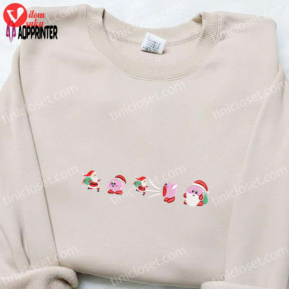 Kirby eating santa shirt: festive game character hoodie & sweatshirt