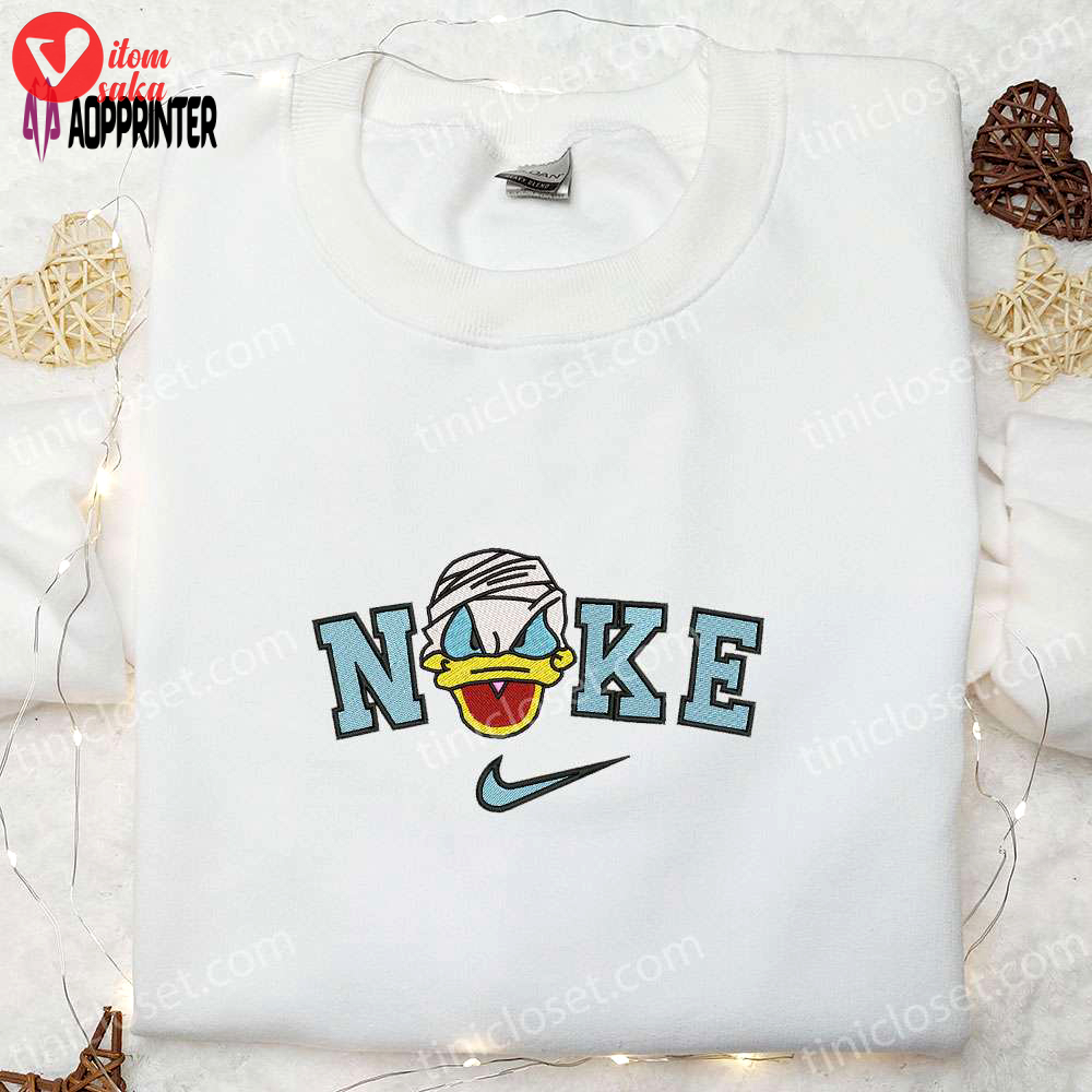 Nike x donald duck embroidered shirt: best family gift with nike-inspired design