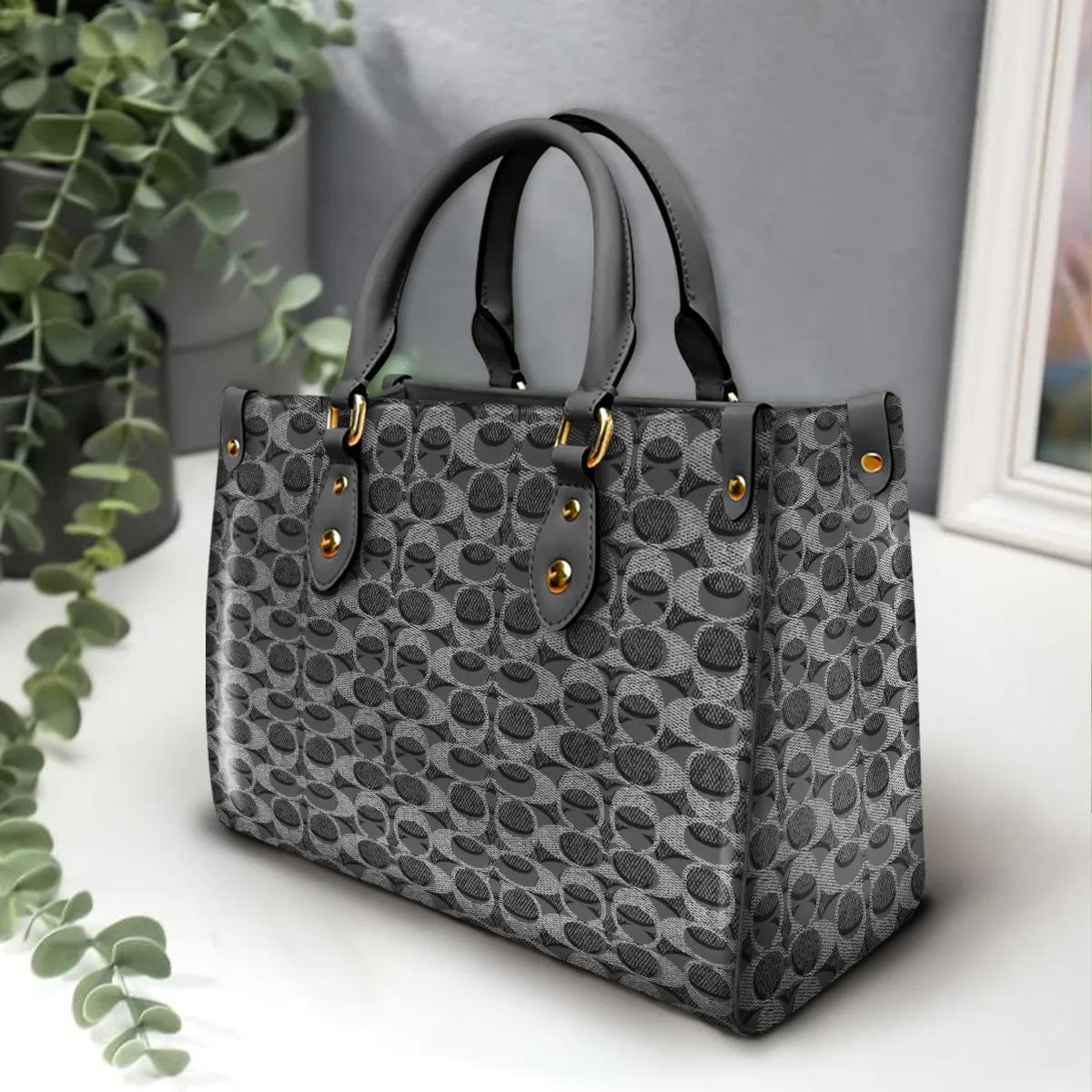 Coach Statement Leather Tote in Classic Black and Gold