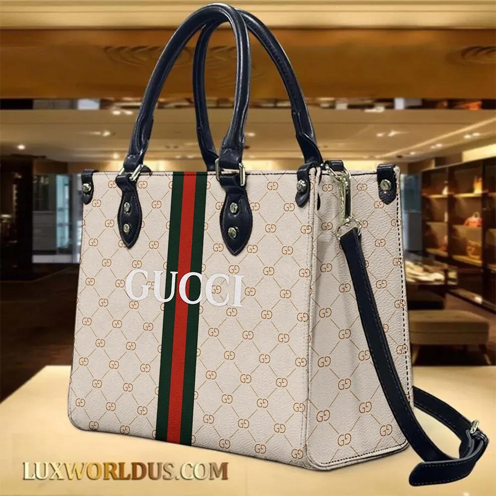 Gucci Luxurious Leather Tote Bag in Cream with Iconic Stripe