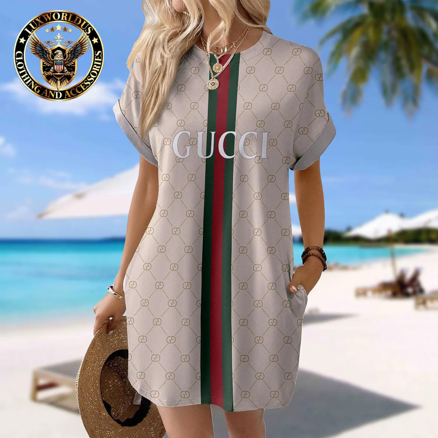 Gucci Statement Sleeve Pocket Dress | Luxurious White and Gold Monogram Design