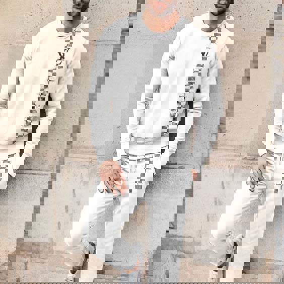 Louis Vuitton White Checkered Sweater And Pants Set | Luxury Lifestyle Ad