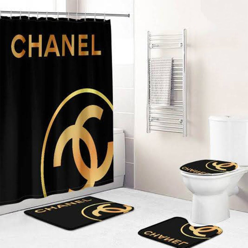 Chanel golden logo in black background bathroom accessories set