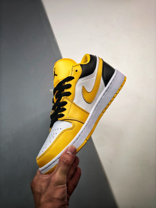 Air jordan 1 low taxi university gold/white/black 553560-701