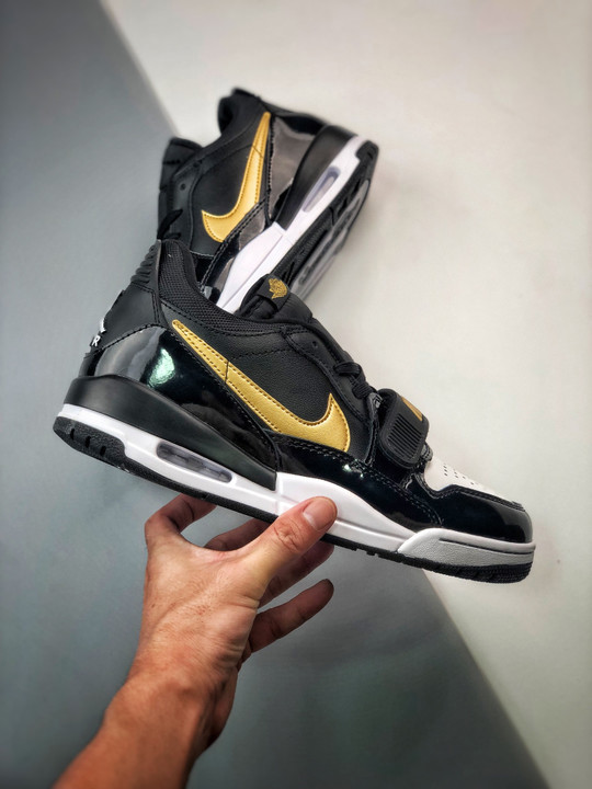 Jordan legacy 312 low black gold cd7069-071