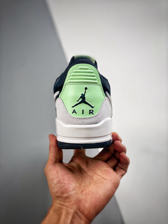 Jordan legacy 312 low black white teal tint