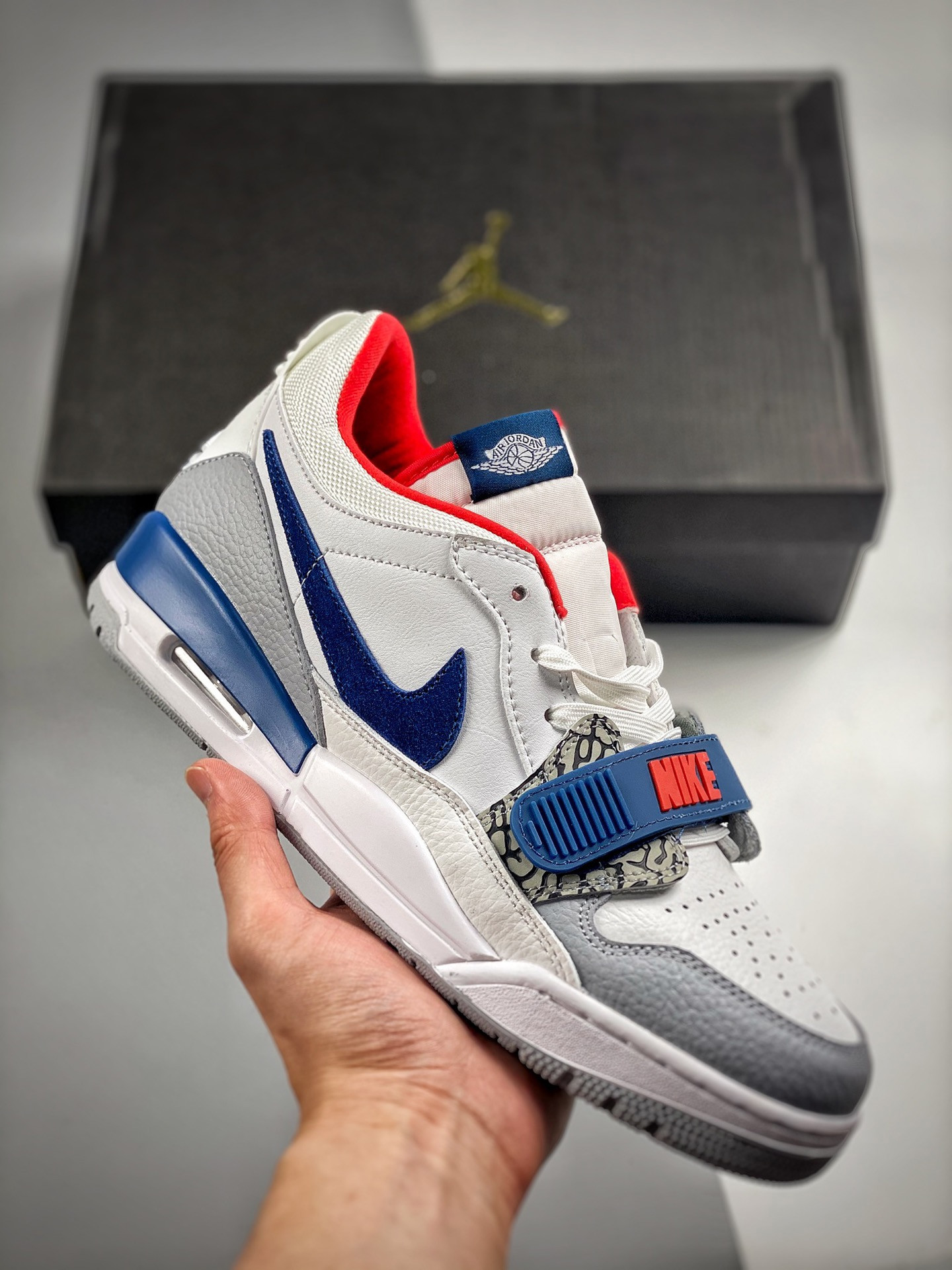 Jordan legacy 312 low white/french blue-wolf grey-university red