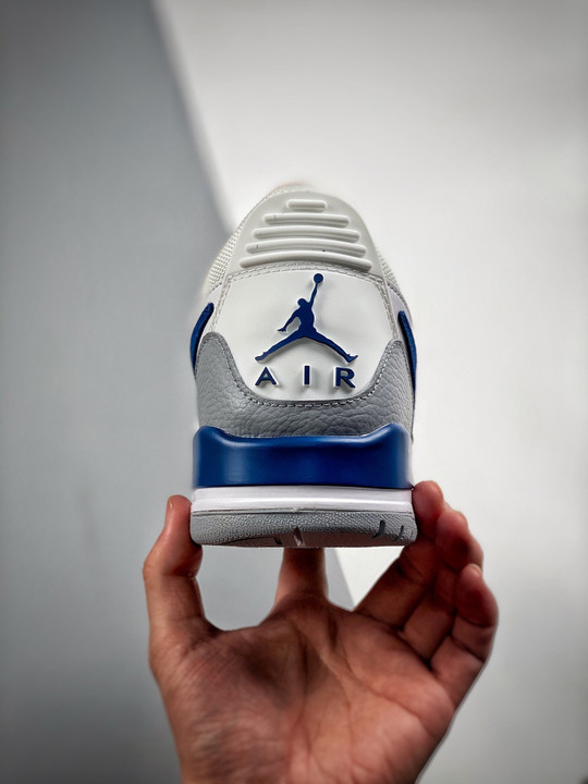 Jordan legacy 312 low white/french blue-wolf grey-university red