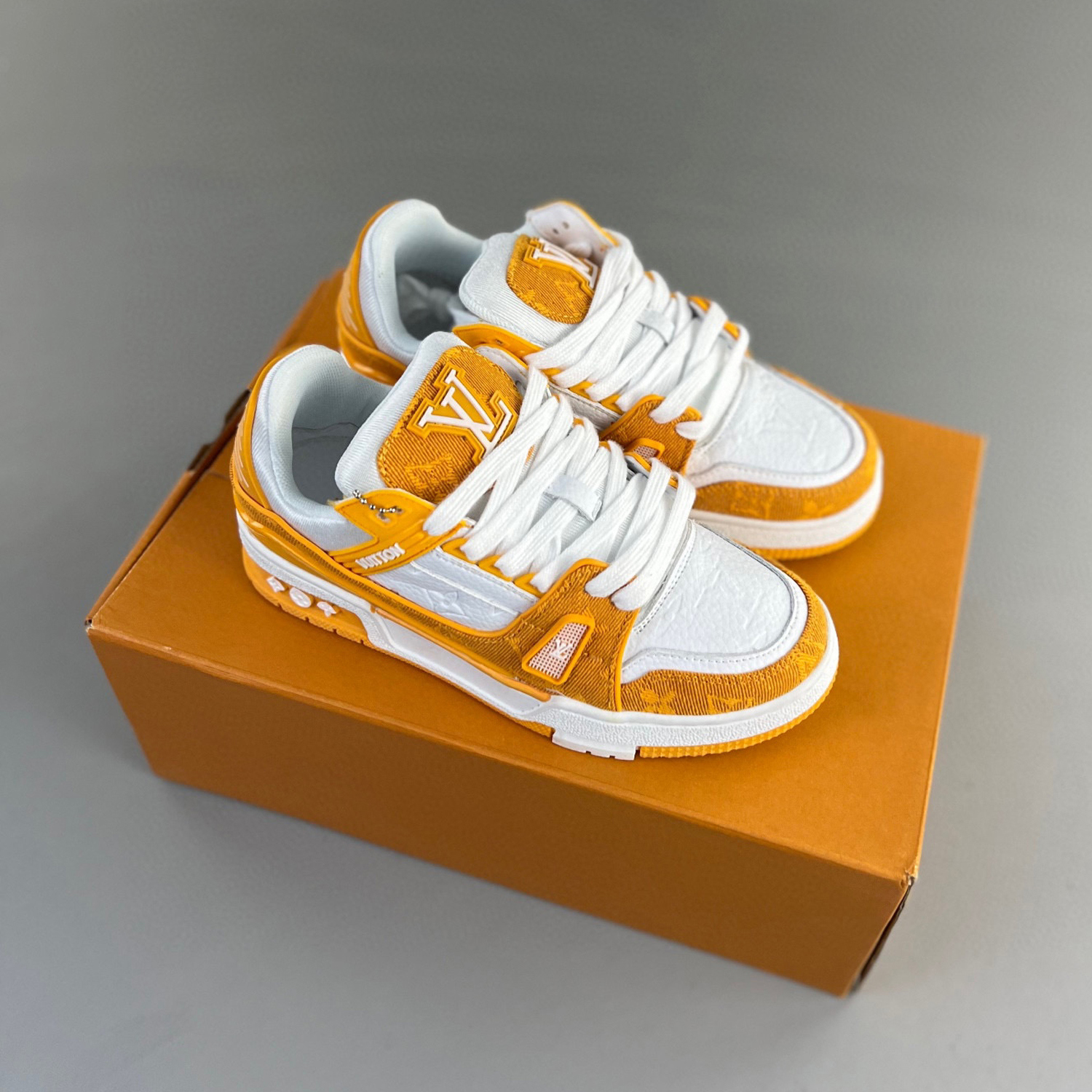 Louis vuitton lv trainer sneaker light orange canvas